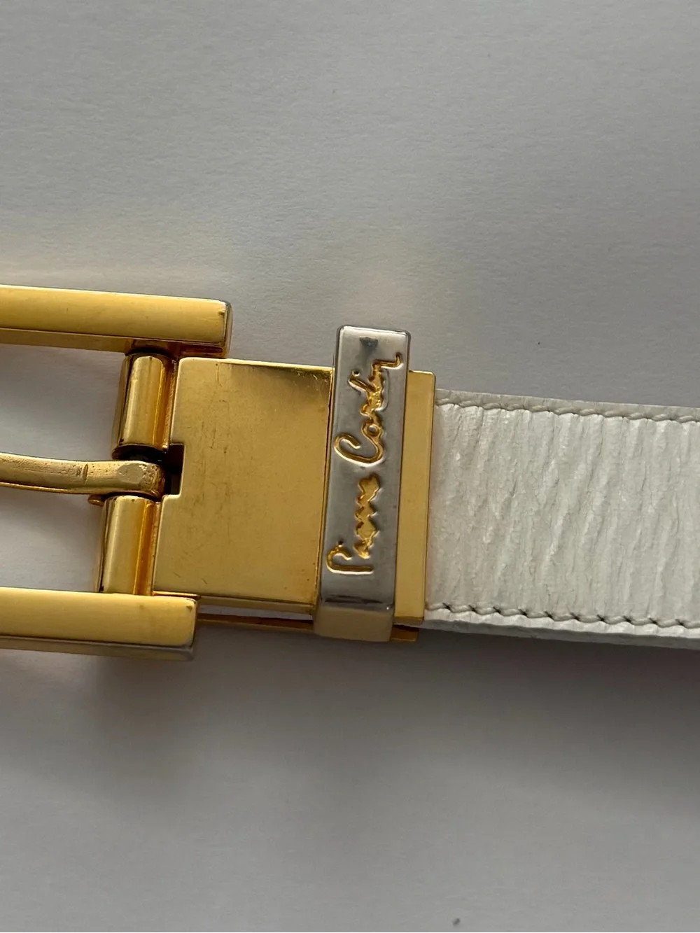 pierre cardin white belt textured, leather-and gold-tone buckle.